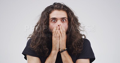Buy stock photo Scared, portrait and man with shock in studio for traumatic event, bad news or overwhelmed by fear. Mockup, witness and person cover mouth with anxiety, panic or unexpected danger on white background