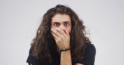 Buy stock photo Surprise, shock and portrait of man with fear, mind blown or secret on white studio background space. Wow, person or cover mouth with face expression for fake news, danger or scared with horror story