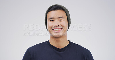 Buy stock photo Portrait, Asian man or student with smile in studio for education, scholarship and college. Space, male academic or beanie for learning, study opportunity or university curriculum on white background