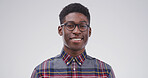 Portrait, black man and student with smile in studio for education, scholarship and college. Space, male pupil and glasses of learning, study opportunity and university curriculum on white background