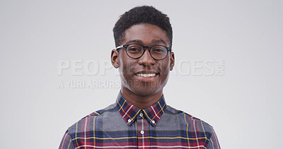 Buy stock photo Portrait, black man and student with smile in studio for education, scholarship and college. Space, male person or glasses of learning, study opportunity and university curriculum on white background
