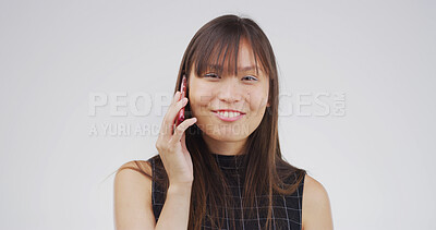 Buy stock photo Asian woman, portrait and phone call in studio for communication, contact or chat on white background. Smile, person with mobile conversation or networking for connection, space or technology
