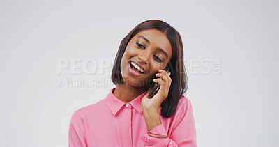 Buy stock photo Studio, woman and listening to contact, phone call and communication with tech, talk and discussion. White background, Indian person and chat with mobile, mockup space and happy for conversation
