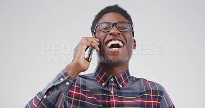 Buy stock photo Black man, phone call and happy with laugh in studio for funny story, chat or gossip on white background. African person, student and smartphone for joke, nerd and comic discussion with mockup space