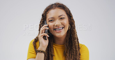 Buy stock photo Portrait, phone call and woman in studio, smile and communication on white background. Person, smartphone and user experience with connection, conversation and chatting to contact and discussion
