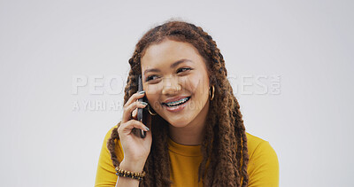 Buy stock photo Designer, thinking or happy woman in studio with phone call, chat or conversation on white background. Listen, deal or creative female person on mobile discussion with smile, feedback or mockup space