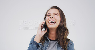 Buy stock photo Laughing, woman and gossip with phone call, communication or talking to contact with tech or studio. Happy, person and listening to funny joke on mobile, white background and digital conversation