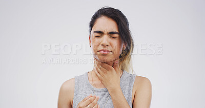 Buy stock photo Pain, sick or woman with itchy throat on studio space for cold, sore voice or virus symptoms. Dry, crisis or person choking on white background with flu allergy, thyroid inflammation or neck injury
