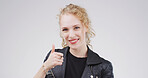 Thumbs up, happy and portrait of woman in studio for agreement, feedback or vote for creative career. Smile, good news and copywriter with approval hand gesture for publishing by white background.