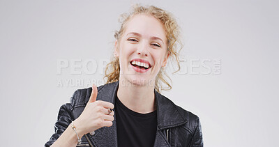 Buy stock photo Woman, portrait and smile with thumbs up in studio, motivation or promotion with praise. Agreement, success or hand gesture for yes, thank you or feedback with sign for review on white background