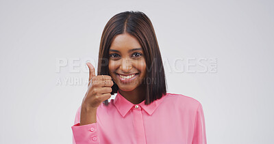 Buy stock photo Thumbs up, happy and portrait of businesswoman in studio for agreement, feedback or vote for investment. Smile, good news and Indian financial manager with approval hand gesture by white background.