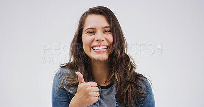 Buy stock photo Positive, portrait or woman with thumbs up in studio for vote support, agreement and good job. Mockup space, person and like emoji on white background for celebration, confirmation or excellence sign
