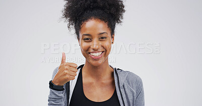 Buy stock photo Happy, black woman and portrait with thumbs up in studio for fitness on a white background. Active, female person or African model with smile, like emoji or yes sign for physical health or wellness