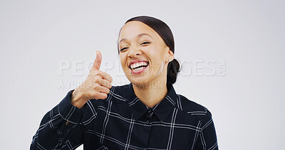 Buy stock photo Portrait, laugh and woman with thumbs up in studio for success, support or agreement. Funny, model and like hand gesture with emoji for feedback, excellence and review on white background space