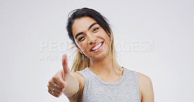 Buy stock photo Thumbs up, woman and portrait in studio for agreement, yes emoji or like on white background. Success, motivation or promo with hand gesture, feedback or review with vote, sign of praise and space