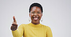 Excited, portrait and black woman with thumbs up in studio for vote approval, support or agreement. Mockup space, happy and person with yes emoji for successful review or good job on white background
