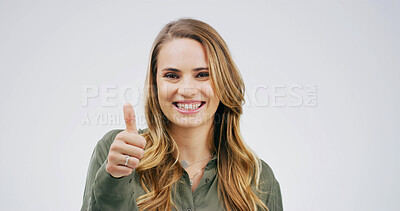 Buy stock photo Portrait, woman and sign with thumbs up in studio for good news, agreement and like feedback. Space, female person and hand gesture for thank you, support vote and show decision on white background