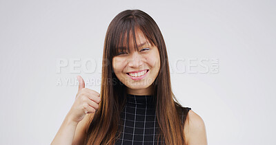 Buy stock photo Thumbs up, smile and portrait of businesswoman in studio for agreement, feedback or vote for investment. Happy, good news and Asian financial manager with approval hand gesture by white background.