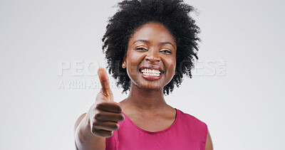 Buy stock photo Portrait, smile and black woman with thumbs up in studio for success, support or agreement. Happy, model and like hand gesture with emoji for feedback, excellence and review on white background space