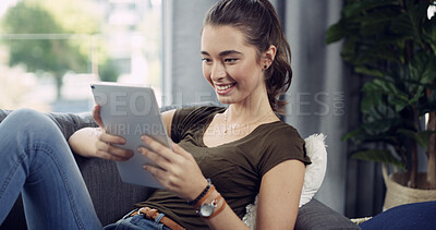 Buy stock photo Tablet, happy and woman on sofa in home reading ebook, blog or research on app for weekend activity. Relax, calm and female person with digital technology for social media in living room at apartment