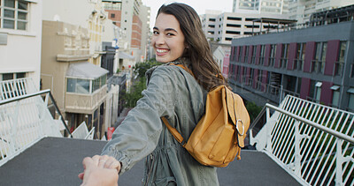 Buy stock photo Holding hands, happy and portrait of woman in city on holiday, travel or weekend trip for sightseeing. Adventure, POV and female person with boyfriend on vacation together in urban town for getaway.