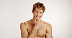 Skincare, smile and portrait of man in studio with beauty, natural or facial treatment for confidence. Mockup space, shirtless and male person from London with dermatology routine by white background
