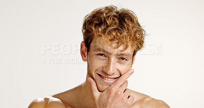 Buy stock photo Beauty, man and smile for skincare, studio or dermatology for smooth skin, portrait or mockup space. White background, confident and facial treatment for person, shirtless and happy for glow in USA