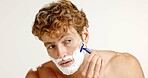 Man, razor or cream in studio for hair removal, depilation or protection foam for skincare. Beard maintenance, soap or person on white background space with blade, shaving or routine facial treatment