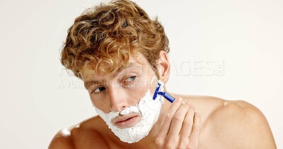 Buy stock photo Man, razor or cream in studio for hair removal, depilation or protection foam for skincare. Beard maintenance, soap or person on white background space with blade, shaving or routine facial treatment