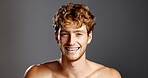 Man, beauty and laugh in portrait for skincare, mockup and dermatology on a grey background. Facial hair, self care and male model happy with cosmetics, confidence and grooming with funny joke
