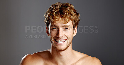 Buy stock photo Man, beauty and laugh in portrait for skincare, mockup and dermatology on a grey background. Facial hair, self care and male model happy with cosmetics, confidence and grooming with funny joke