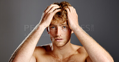 Buy stock photo Portrait, confident man and hair care in studio for beauty, grooming and texture on gray background. Face, hairstyle and person at salon for scalp treatment, barber or growth cosmetics for aesthetic