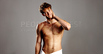 Buy stock photo Portrait, man and topless for skincare in studio with natural beauty, facial treatment and abs. Smile, person and confidence with dermatology glow, grooming routine or muscle on gray background space