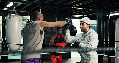 Buy stock photo Gym, sports and training with people in boxing ring for fitness, self defense or sparring. Boxer, challenge and fight with men punching in combat for competition, exercise or performance as athlete