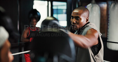 Buy stock photo Fitness, sports and training with people in boxing ring for combat, self defense or sparring. Boxer, challenge and fight with men punching in gym for competition, exercise or performance as athlete