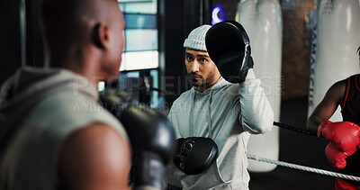 Buy stock photo Exercise, sports and training with people in boxing ring for combat, self defense or sparring. Boxer, challenge and fight with men punching in gym for competition, fitness or performance as athlete