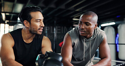 Buy stock photo Friends, boxing ring and men on break for fitness, sports or training advice in health club. Gym, boxer and resting together with athlete for fight technique, exercise or coaching with conversation