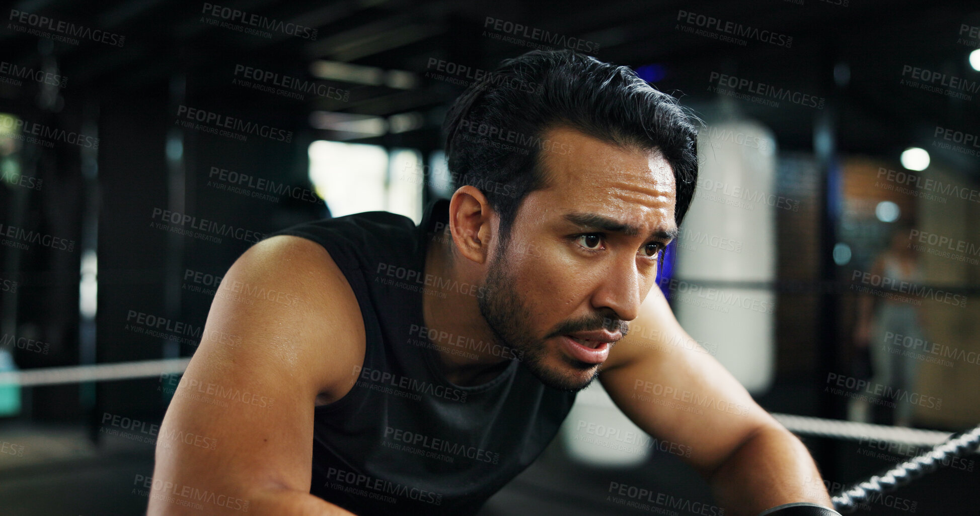 Buy stock photo Breathing, sweating and tired with man in boxing gym for break, recovery or rest from training. Fatigue, fitness and exercise with exhausted boxer in health club for challenge or intense workout