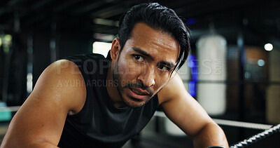 Buy stock photo Man, tired and sweat in boxing ring for training with rest, burnout and prepare for fight at gym. Person, athlete and break for fatigue, challenge and exercise for contest, workout or fitness at club
