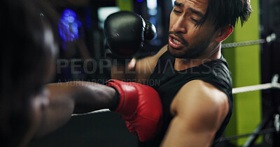 Buy stock photo Boxing, men and training with wellness, fight and challenge with power, exercise and fitness. People, gloves and boxer in gym, sparring practice and battle competition with skills, punch and defence