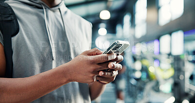 Buy stock photo Hands, smartphone and man in gym, fitness and health with digital app for progress. Person, mobile user and athlete in wellness center, cellphone and social media with exercise, network or chatting
