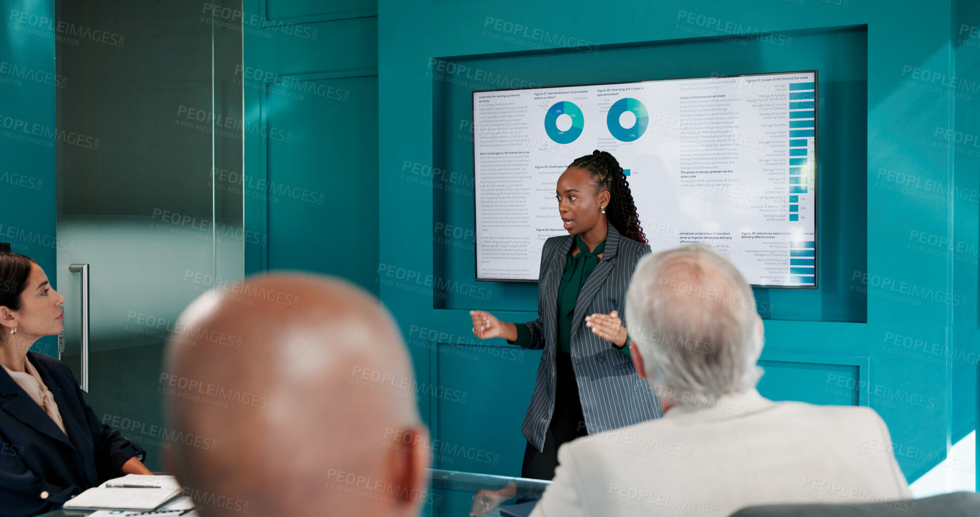 Buy stock photo Woman, presentation and screen at meeting with charts, discussion or review at finance agency. Person, speaker and operations manager by monitor for feedback, statistics or problem solving at company