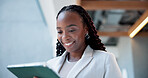 Happy, black woman and reading on tablet in office for research, booking flight and travel information. Smile, female person and digital for schedule, online ticket and browsing website for work trip