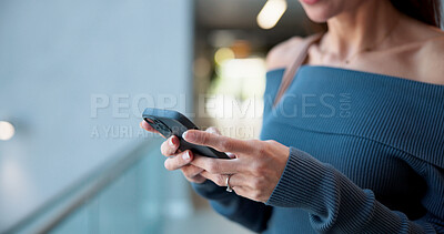 Buy stock photo Convention center, hands and phone with business woman in lobby for email update or text message. App, communication and social media with employee at conference for development event or symposium
