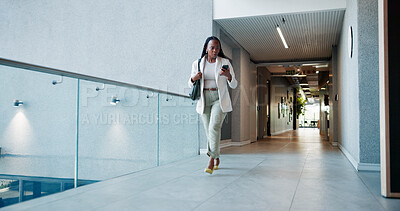 Buy stock photo Worried, black woman and phone with bad news for late deadline, concern or notification in hallway. Frustrated, female person or employee with mobile smartphone for schedule delay, fail or mistake