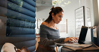 Buy stock photo Laptop, typing and woman in office pod for privacy, concentration and journalist research story. Serious employee, computer and writing news review, creative report and hybrid work in business booth