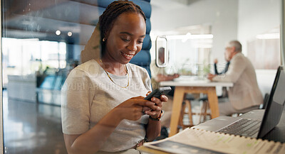 Buy stock photo Business, woman and typing with phone in pod for finance research, investment chat or client email. Financial advisor, hybrid work or happy black person with smartphone in office cubicle for feedback
