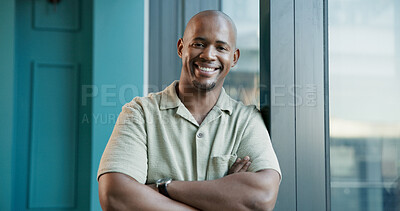 Buy stock photo Portrait, creative and black man with arms crossed for business, ambition or pride with journalist. Smile, startup and confident African worker, professional and news reporter in office in Kenya