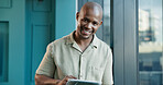Portrait, business and happy black man with tablet in office for event planning or coordination. Smile, startup and African professional with technology for venue research or creative work at window