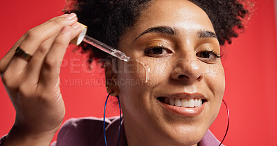 Buy stock photo Woman, face and serum for skincare, hydration and collagen treatment with cosmetics in studio. Portrait, person and model with pipette for facial oil, vitamin c or wellness closeup on red background